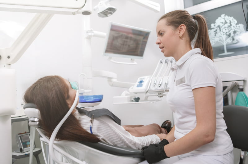 Patient receiving sedation before a dental procedure to reduce anxiety