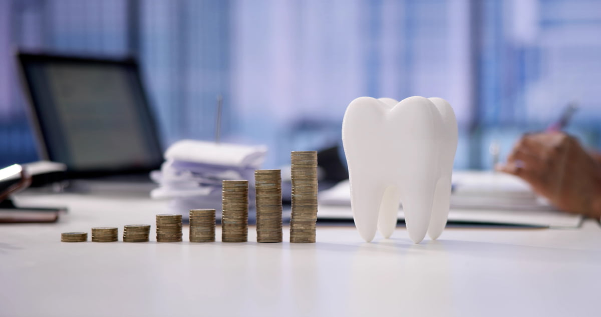 Patient reviewing dental treatment costs and insurance billing options at a dental clinic in Barrie
