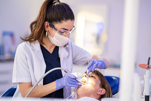 Patient receiving emergency root canal treatment for severe toothache in Barrie
