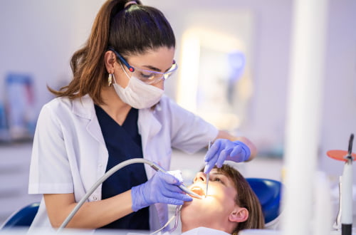 Woman receiving root canal treatment at a dental clinic in Barrie