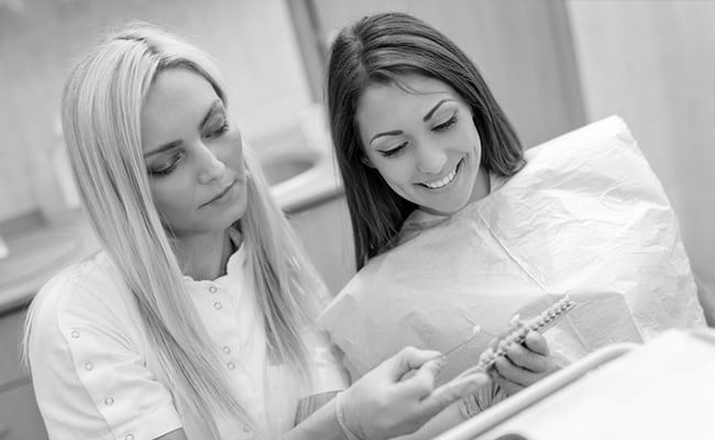 Patient attending a dental consultation about porcelain veneers and smile enhancement in Barrie