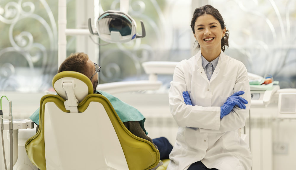 Dentist explaining what to eat after a dental procedure during a recovery consultation